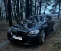 Черный БМВ 7 Серия, объемом двигателя 3 л и пробегом 140 тыс. км за 12299 $, фото 1 на Automoto.ua