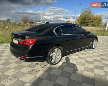Черный БМВ 7 Серия, объемом двигателя 3 л и пробегом 142 тыс. км за 27000 $, фото 5 на Automoto.ua