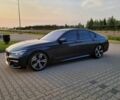 Черный БМВ 7 Серия, объемом двигателя 4.4 л и пробегом 132 тыс. км за 36900 $, фото 4 на Automoto.ua