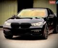 Чорний БМВ 7 Серія, об'ємом двигуна 3 л та пробігом 218 тис. км за 27900 $, фото 1 на Automoto.ua