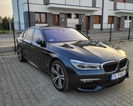 Черный БМВ 7 Серия, объемом двигателя 4.4 л и пробегом 132 тыс. км за 36900 $, фото 1 на Automoto.ua