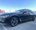 Чорний БМВ 7 Серія, об'ємом двигуна 3 л та пробігом 165 тис. км за 33700 $, фото 1 на Automoto.ua