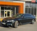 Черный БМВ 7 Серия, объемом двигателя 4.39 л и пробегом 180 тыс. км за 31499 $, фото 1 на Automoto.ua