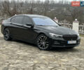 Черный БМВ 7 Серия, объемом двигателя 3 л и пробегом 185 тыс. км за 27000 $, фото 1 на Automoto.ua