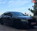 Черный БМВ 7 Серия, объемом двигателя 3 л и пробегом 224 тыс. км за 31490 $, фото 1 на Automoto.ua