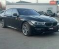 Черный БМВ 7 Серия, объемом двигателя 2.99 л и пробегом 178 тыс. км за 37990 $, фото 1 на Automoto.ua