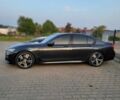 Черный БМВ 7 Серия, объемом двигателя 4.4 л и пробегом 132 тыс. км за 36900 $, фото 2 на Automoto.ua