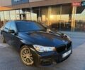 Чорний БМВ 7 Серія, об'ємом двигуна 2.98 л та пробігом 196 тис. км за 26900 $, фото 1 на Automoto.ua
