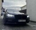Чорний БМВ 7 Серія, об'ємом двигуна 4.4 л та пробігом 182 тис. км за 36999 $, фото 1 на Automoto.ua