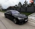 Черный БМВ 7 Серия, объемом двигателя 3 л и пробегом 122 тыс. км за 28000 $, фото 1 на Automoto.ua