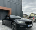 Черный БМВ 7 Серия, объемом двигателя 3 л и пробегом 147 тыс. км за 36000 $, фото 1 на Automoto.ua