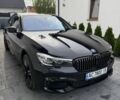 Чорний БМВ 7 Серія, об'ємом двигуна 2 л та пробігом 159 тис. км за 28070 $, фото 1 на Automoto.ua