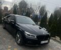 Чорний БМВ 7 Серія, об'ємом двигуна 4.39 л та пробігом 174 тис. км за 39999 $, фото 1 на Automoto.ua