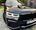 Чорний БМВ 7 Серія, об'ємом двигуна 4.4 л та пробігом 130 тис. км за 37000 $, фото 1 на Automoto.ua