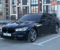 Чорний БМВ 7 Серія, об'ємом двигуна 3 л та пробігом 160 тис. км за 34500 $, фото 1 на Automoto.ua