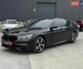 Чорний БМВ 7 Серія, об'ємом двигуна 3 л та пробігом 158 тис. км за 35990 $, фото 1 на Automoto.ua