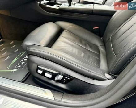 Черный БМВ 7 Серия, объемом двигателя 2.99 л и пробегом 102 тыс. км за 35900 $, фото 30 на Automoto.ua