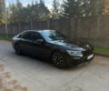 Черный БМВ 7 Серия, объемом двигателя 3 л и пробегом 80 тыс. км за 39500 $, фото 6 на Automoto.ua
