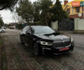 Черный БМВ 7 Серия, объемом двигателя 3 л и пробегом 83 тыс. км за 55000 $, фото 1 на Automoto.ua