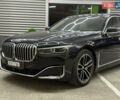 Черный БМВ 7 Серия, объемом двигателя 4.4 л и пробегом 115 тыс. км за 46000 $, фото 1 на Automoto.ua