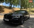 Черный БМВ 7 Серия, объемом двигателя 2.99 л и пробегом 100 тыс. км за 60000 $, фото 1 на Automoto.ua
