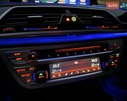 Черный БМВ 7 Серия, объемом двигателя 3 л и пробегом 107 тыс. км за 74950 $, фото 63 на Automoto.ua