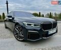 Черный БМВ 7 Серия, объемом двигателя 2.99 л и пробегом 87 тыс. км за 75000 $, фото 1 на Automoto.ua