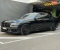 Чорний БМВ 7 Серія, об'ємом двигуна 3 л та пробігом 124 тис. км за 43000 $, фото 1 на Automoto.ua