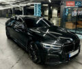 Черный БМВ 7 Серия, объемом двигателя 2.99 л и пробегом 130 тыс. км за 73000 $, фото 1 на Automoto.ua