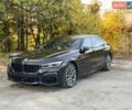 Черный БМВ 7 Серия, объемом двигателя 3 л и пробегом 99 тыс. км за 55999 $, фото 1 на Automoto.ua