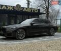 Черный БМВ 7 Серия, объемом двигателя 3 л и пробегом 91 тыс. км за 64900 $, фото 1 на Automoto.ua