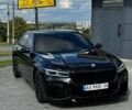 Черный БМВ 7 Серия, объемом двигателя 4.39 л и пробегом 95 тыс. км за 63000 $, фото 1 на Automoto.ua