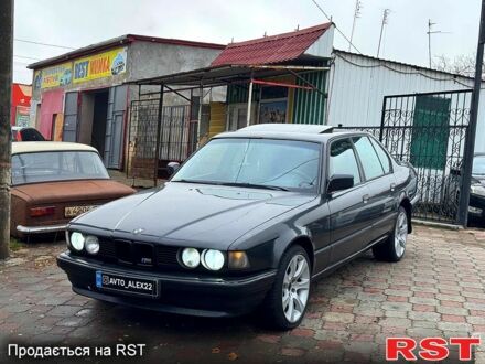 Черный БМВ 7 Серия, объемом двигателя 3.5 л и пробегом 300 тыс. км за 2499 $, фото 1 на Automoto.ua