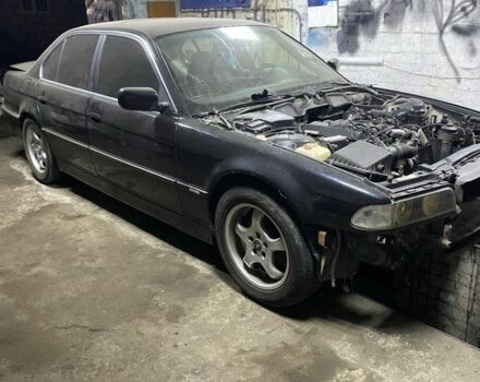 Черный БМВ 7 Серия, объемом двигателя 4 л и пробегом 396 тыс. км за 1999 $, фото 1 на Automoto.ua