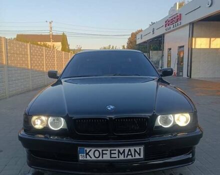 Черный БМВ 7 Серия, объемом двигателя 3 л и пробегом 450 тыс. км за 5600 $, фото 1 на Automoto.ua