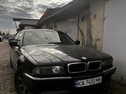 Черный БМВ 7 Серия, объемом двигателя 4 л и пробегом 200 тыс. км за 900 $, фото 1 на Automoto.ua