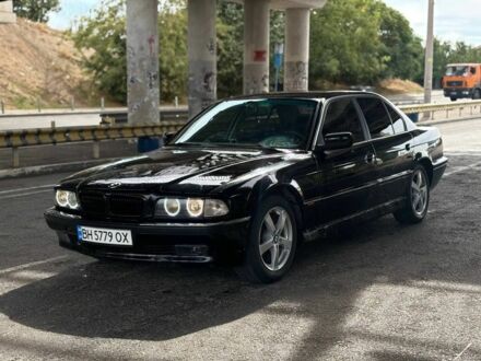 Черный БМВ 7 Серия, объемом двигателя 3 л и пробегом 300 тыс. км за 3450 $, фото 1 на Automoto.ua