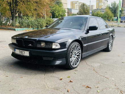 Черный БМВ 7 Серия, объемом двигателя 4 л и пробегом 302 тыс. км за 7700 $, фото 1 на Automoto.ua