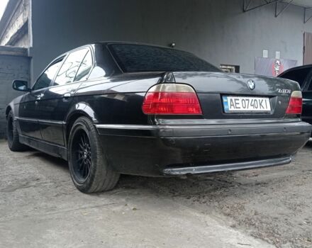 Черный БМВ 7 Серия, объемом двигателя 4 л и пробегом 510 тыс. км за 3450 $, фото 1 на Automoto.ua