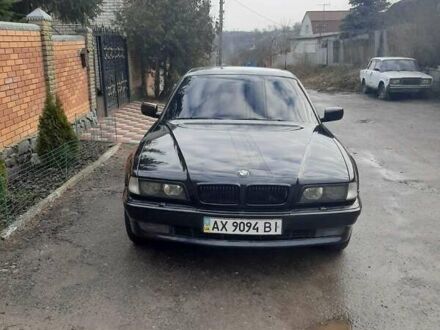 Черный БМВ 7 Серия, объемом двигателя 4.4 л и пробегом 340 тыс. км за 6600 $, фото 1 на Automoto.ua