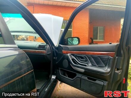 Черный БМВ 7 Серия, объемом двигателя 3.5 л и пробегом 365 тыс. км за 4000 $, фото 1 на Automoto.ua