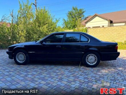Чорний БМВ 7 Серія, об'ємом двигуна 3.5 л та пробігом 350 тис. км за 3800 $, фото 1 на Automoto.ua