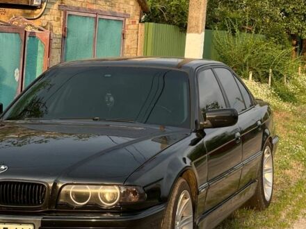 Черный БМВ 7 Серия, объемом двигателя 4.4 л и пробегом 350 тыс. км за 6300 $, фото 1 на Automoto.ua