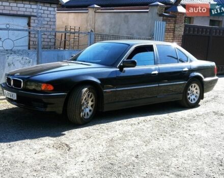 Черный БМВ 7 Серия, объемом двигателя 4.4 л и пробегом 350 тыс. км за 5000 $, фото 1 на Automoto.ua