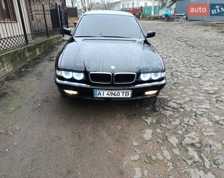 Черный БМВ 7 Серия, объемом двигателя 3.9 л и пробегом 342 тыс. км за 8000 $, фото 1 на Automoto.ua