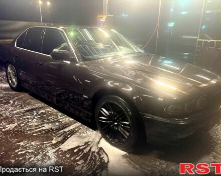 Черный БМВ 7 Серия, объемом двигателя 5.4 л и пробегом 400 тыс. км за 6000 $, фото 1 на Automoto.ua