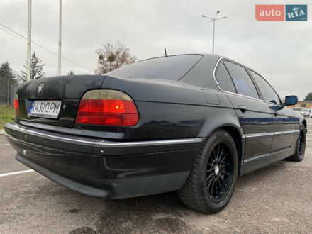 Черный БМВ 7 Серия, объемом двигателя 3.5 л и пробегом 300 тыс. км за 3300 $, фото 1 на Automoto.ua