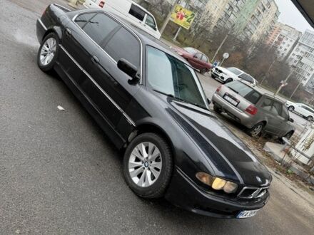 Черный БМВ 7 Серия, объемом двигателя 4.4 л и пробегом 380 тыс. км за 1999 $, фото 1 на Automoto.ua
