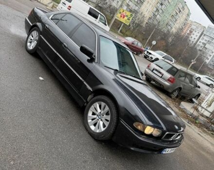 Черный БМВ 7 Серия, объемом двигателя 4.4 л и пробегом 380 тыс. км за 1999 $, фото 1 на Automoto.ua