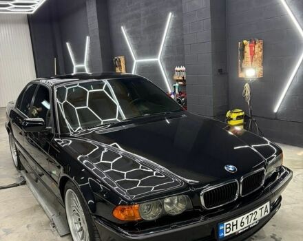 Черный БМВ 7 Серия, объемом двигателя 4.4 л и пробегом 400 тыс. км за 15000 $, фото 1 на Automoto.ua